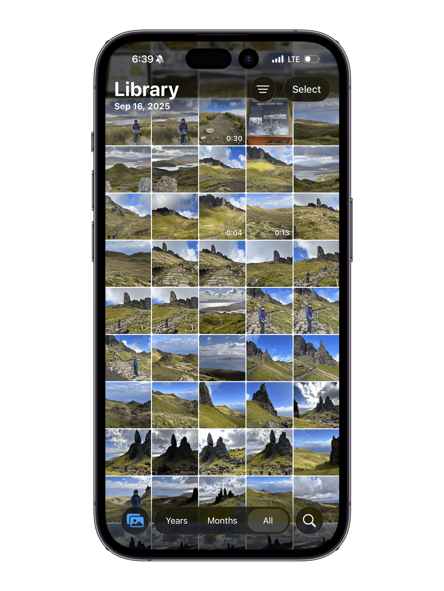 A camera roll grid — hundreds of photos, no story
